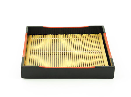 Tray for Japanese food with bamboo isolated on a white background. Use for home or restaurant, food design. Kitchen accessory.の写真素材