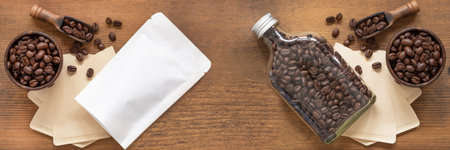 Top view, Roasted coffee beans in white paper bag with zipper and glass bottle, wooden scoop, bowl, filter on rustic wood background. Space for your text, Flat lay, top down. banner size.の写真素材