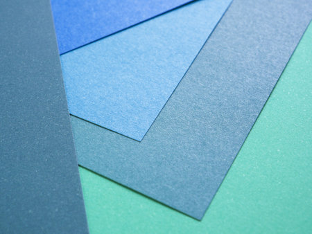 Abstract color paper geometric composition shape and lines sheet of blank blue and green tone. Empty multicolor background  for image, text, art, design, banner, wallpaper, and backdropの写真素材
