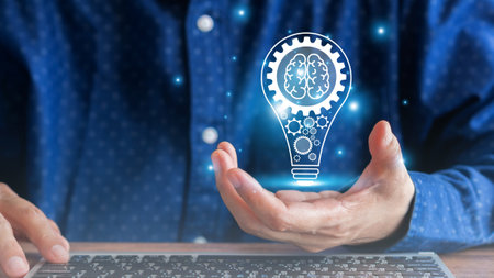 Hand of businessman hold on virtual screen light bulbs icon, the creative idea with innovation, brainstorming, the creativity of the future for business success and corporate. Business background.の写真素材