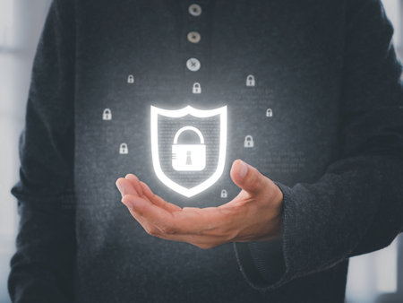 Padlock sign icon on user hand. Security of personal information. Cyber security, data protection concept.の写真素材