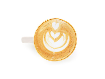 Top view, flat lay hot latte coffee with art heart shape in white ceramic mug with brown rim isolated on whithe background. space for your text.の写真素材