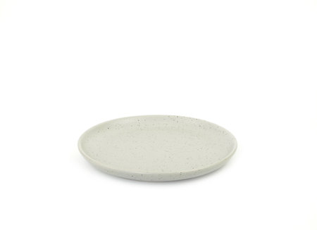 Empty grey round ceramic plate with dotted isolated on a white background. Use for home or restaurant, food design. Kitchen accessory.の写真素材