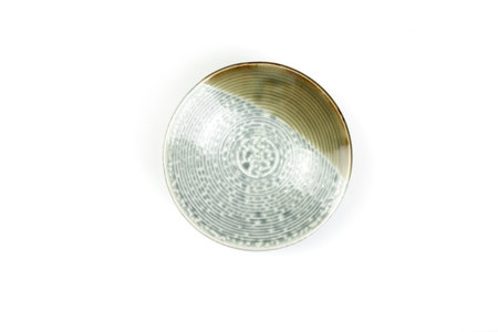 Top view, Light green-dark green round ceramic serving plate isolated on a white background. template for food design, and banner. Use for home or restaurant.の写真素材