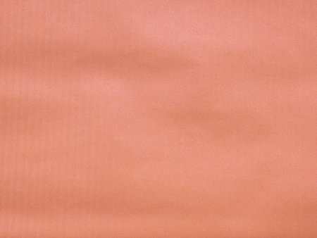 Orange paper with vertical lines, orange background. Idea for design, text and art backdrop.の写真素材