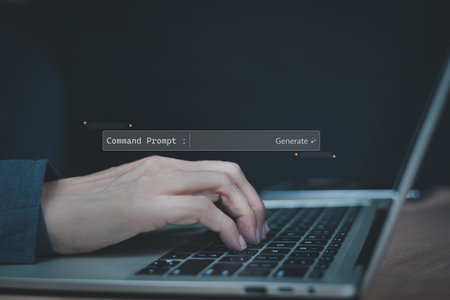 Close-up of a developer's hand typing on a laptop, input a command prompt to generate code using AI....