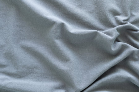 Dark grey cotton fabric with wavy. Beautiful smooth elegant wavy, abstract background design.の写真素材