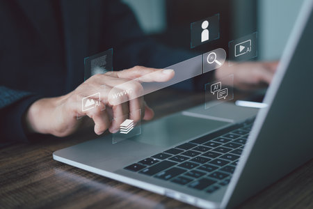 Businessperson utilizing a laptop with an AI-powered search bar interface, highlighting Internet research and data retrieval. Concept digital transformation. Advanced technology for online searching.の写真素材