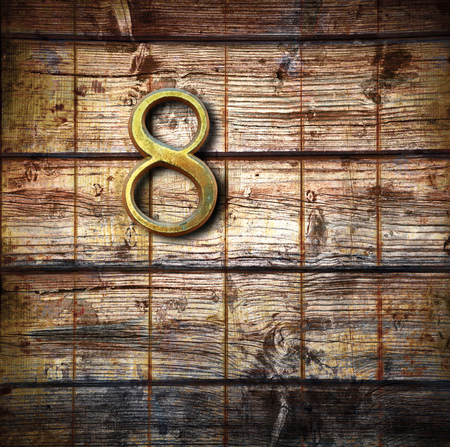 Number eight on a wooden backgroundの写真素材