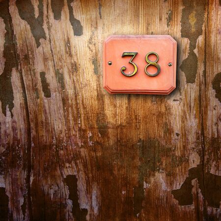 Number38 on a wooden backgroundの写真素材