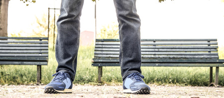 a man standing at the gardens in the suburbsの写真素材