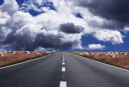 a fantastic desert road with clouds