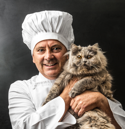 Crazy cook with his catの写真素材