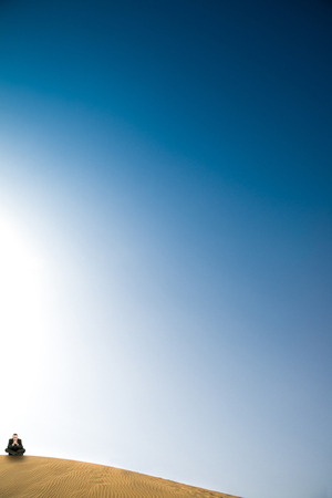 alone manager sitting in a desertの写真素材