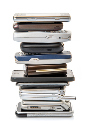 old cellphone on white backgroundの写真素材