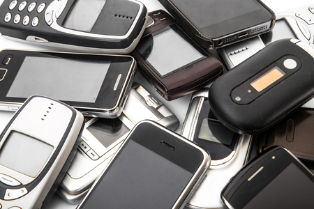 old cellphone on white background