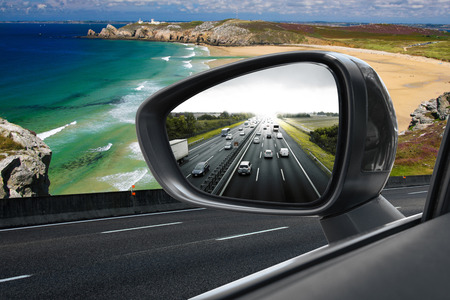 Reflected road in rearview mirrorの写真素材