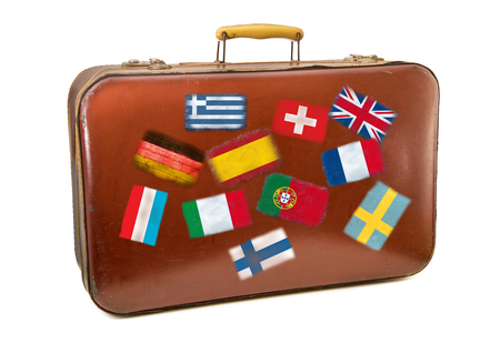Old suitcase on white background for travel in europeの写真素材
