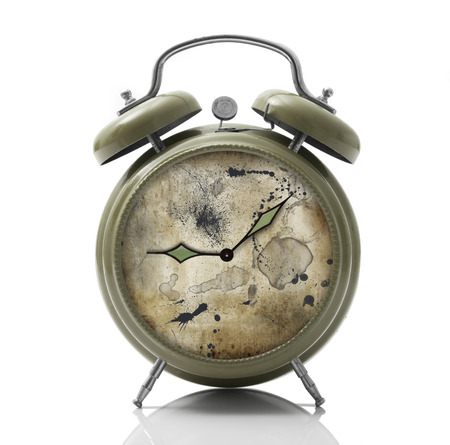 isolated alarm clock with vintage dial on white background