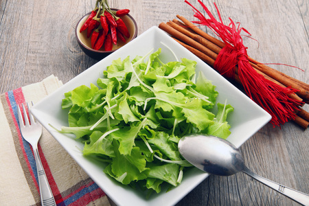 salad on old wooden tableの写真素材