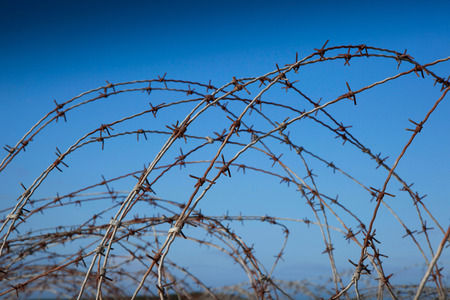 Photo of barbed wire fenceの写真素材