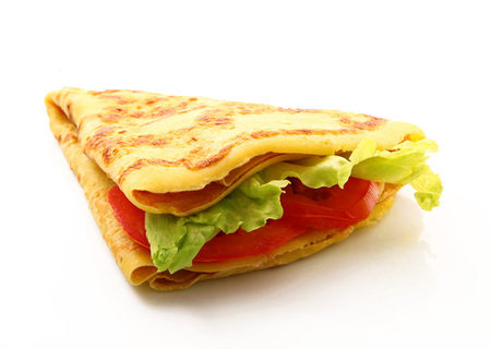 crepes with salad and tomatoes on white backgroundの写真素材