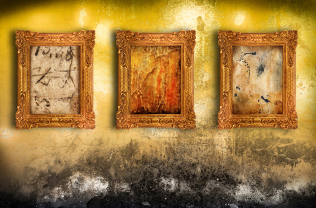 Old frames hanging on the wallの写真素材