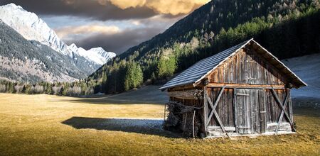 wooden alpine hut in south tyrolの写真素材