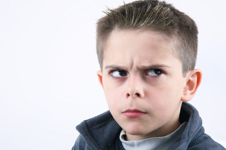 angry young boy on white background angry young boy on white background