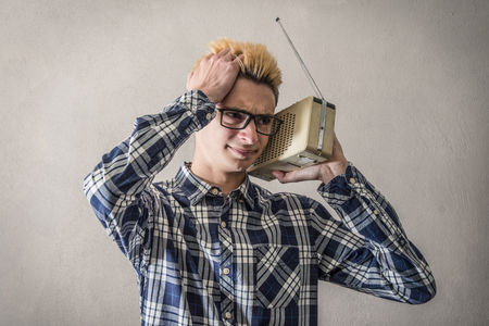 a Boy listening to Radioの写真素材