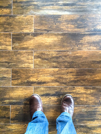 standing on a wood floorの写真素材