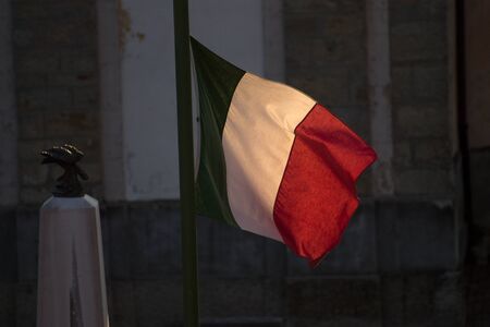 Italian flag with windの写真素材