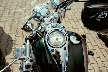 ZwoleÅ„, Masovian Voivodeship, Poland - April 10, 2022. Parking of motorbikes and cars. Group...