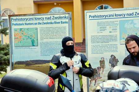 ZwoleÅ, Masovian Voivodeship, Poland - April 10, 2022. Parking of motorbikes and cars. Group present Motorbike showsation.のeditorial素材