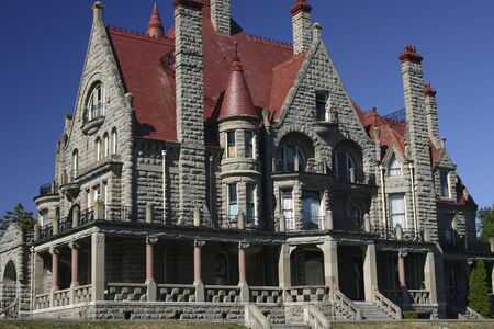 Old Castle type house with deep blue sky in backgroundの写真素材