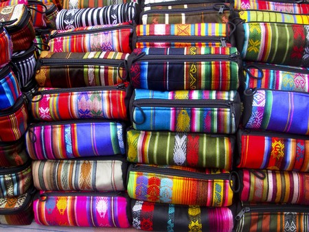 Mutil colored Ecuadorian woven bags made from alpaca wool found in an Ecuador market, South Americaの写真素材