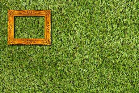 picture frame on artificial grass field background