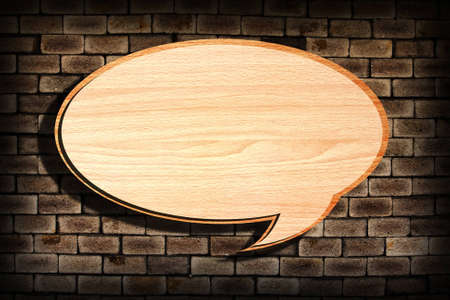 Retro speech bubbles from splat on old brick wall の写真素材