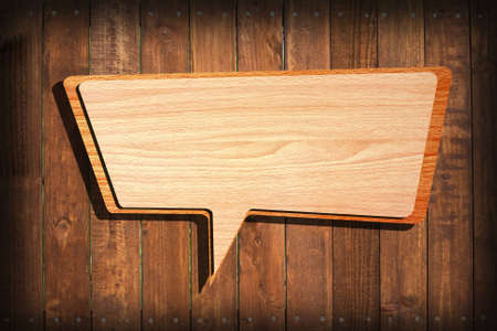Retro speech bubbles from splat on wood wall background  の写真素材