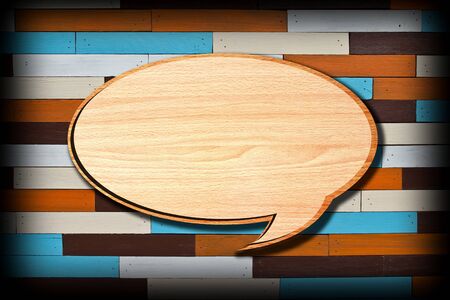 Retro speech bubbles from splat on wood wall background の写真素材