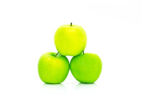 Green apples isolated on white の写真素材