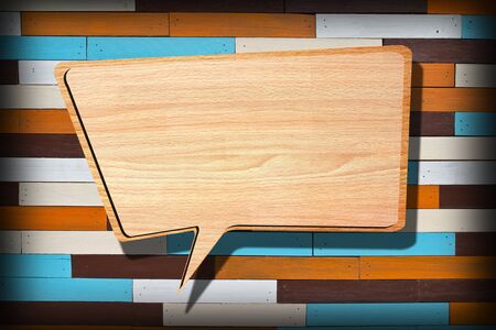 Retro speech bubbles from splat on wood wall background の写真素材