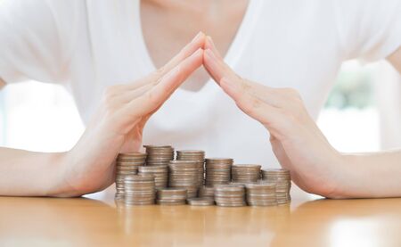 Shiny new money saving or care concept with copy-spaceの写真素材