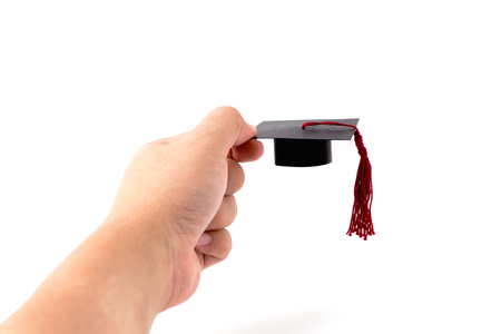 Hand pick up Graduation capの写真素材