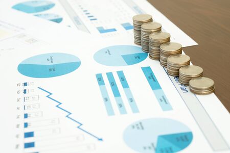 Coin and graph report, fintech concept