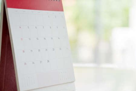 Calendar Standing On Brown Wood Surfaceの写真素材