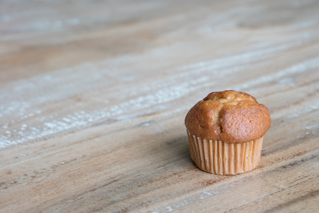 Banana cup cake on the tableの写真素材