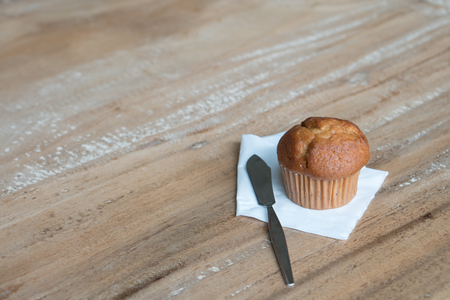 Banana cup cake on the tableの写真素材
