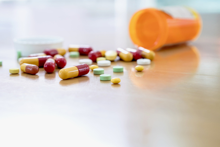 Pills and capsules in medical vialの写真素材