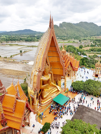 Kanchanaburi, Thailand - 2018 Aug 12 : Temple landmark buddha with pagoda golden statue at sunset,wat tham sua, kanchanaburi, thailandのeditorial素材